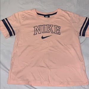 Light orange Nike tee